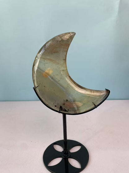 Natural yellow crystal in the shape of a moon crystal