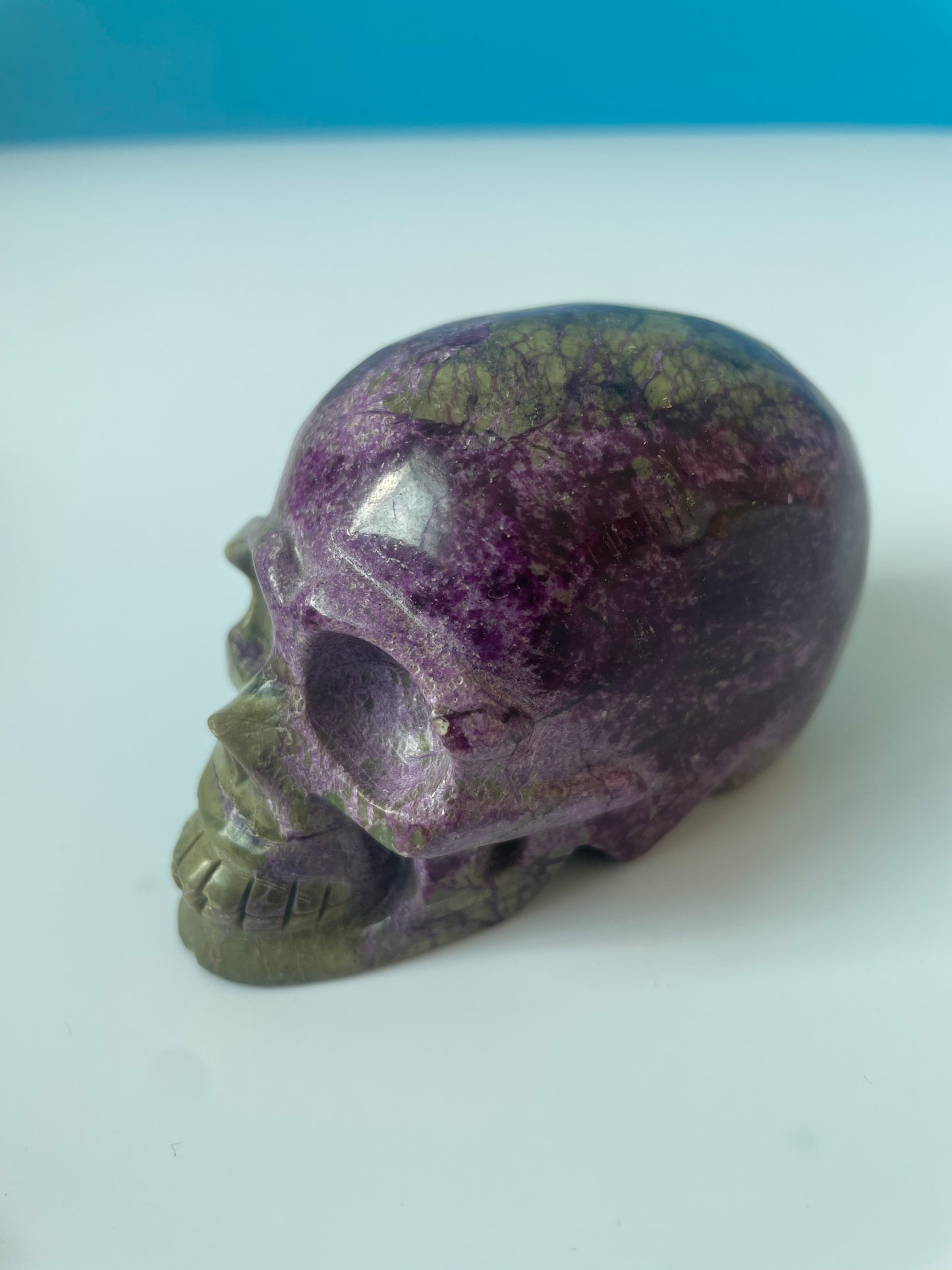 Skeleton crystal carvings of different colors and sizes