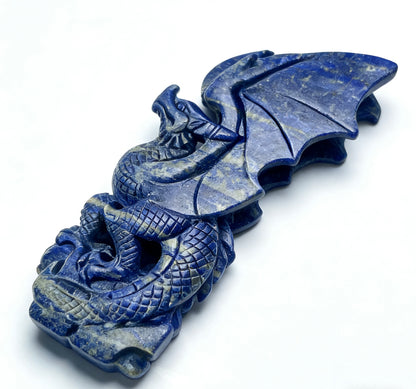 crystal figurine of a flying dragon made of lapis lazuli